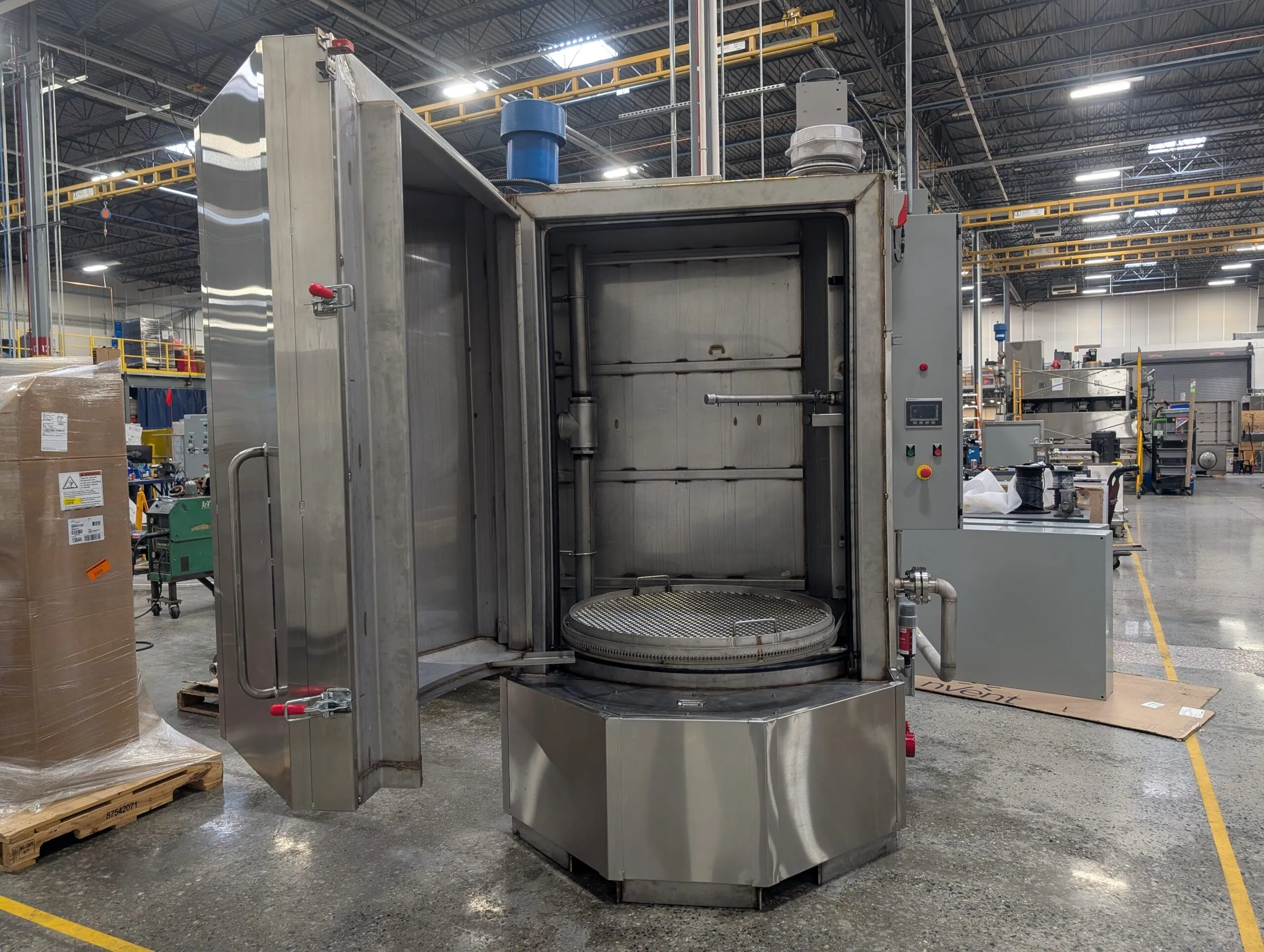 Cabinet Parts Washer designed to clean powder coated mail sorting components.