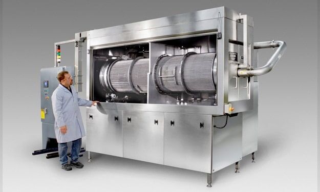 Drum Washer engineered to clean plastic vile stoppers for the pharmaceutical industry