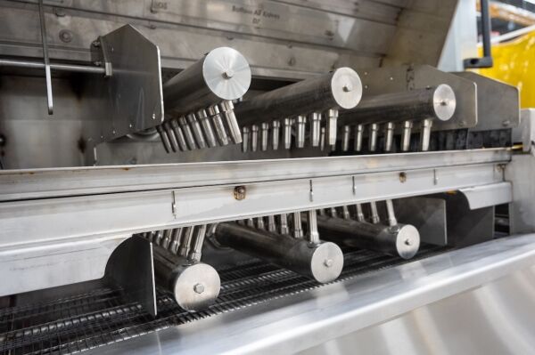 c-14 industrial parts washer on factory floor stainless steel close up 2