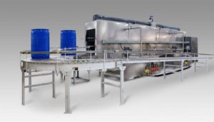 Conveyor washer for cosmetic pail drum