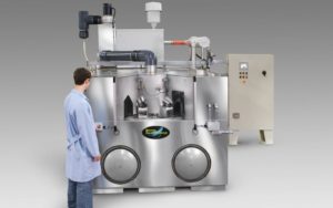 Carousel parts washer cleaning automotive parts