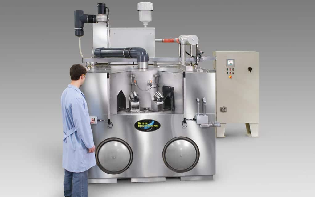 Carousel parts washer cleaning automotive parts