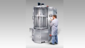 Sanitary turntable washer for cleaning cosmetic tubes