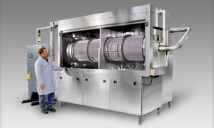 Drum Washer engineered to clean plastic vile stoppers for the pharmaceutical industry