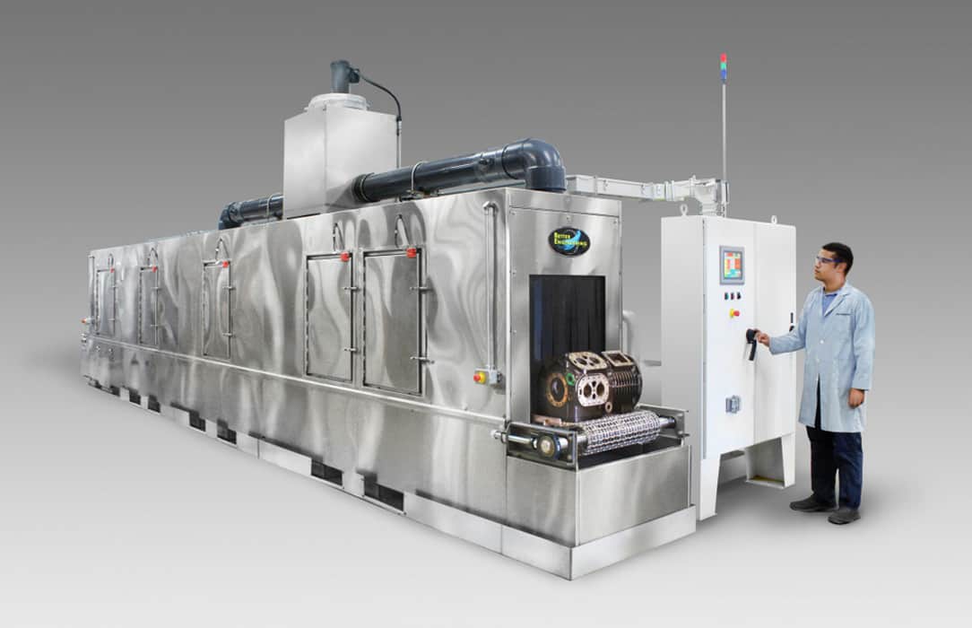 Conveyor belt washer for cleaning compressor parts