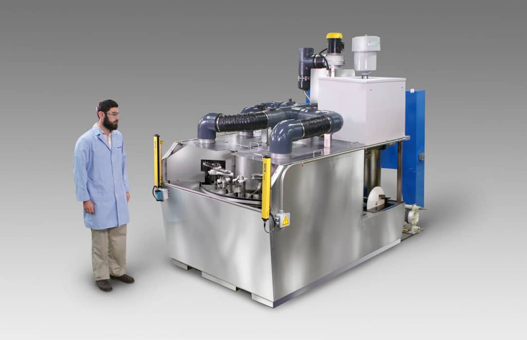 RTO carousel washer for cleaning automotive ring gears, pinion shafts, and differential housings