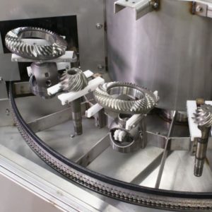RTO carousel washer for cleaning automotive ring gears, pinion shafts, and differential housings