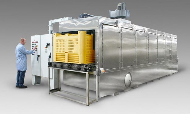 Conveyor belt washer for cleaning macrobins in farming