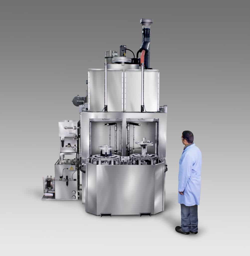 Dual vertical door parts washer for robotic work cell