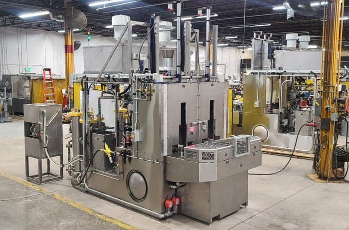 Dual chamber parts washer for cleaning automotive counter shafts