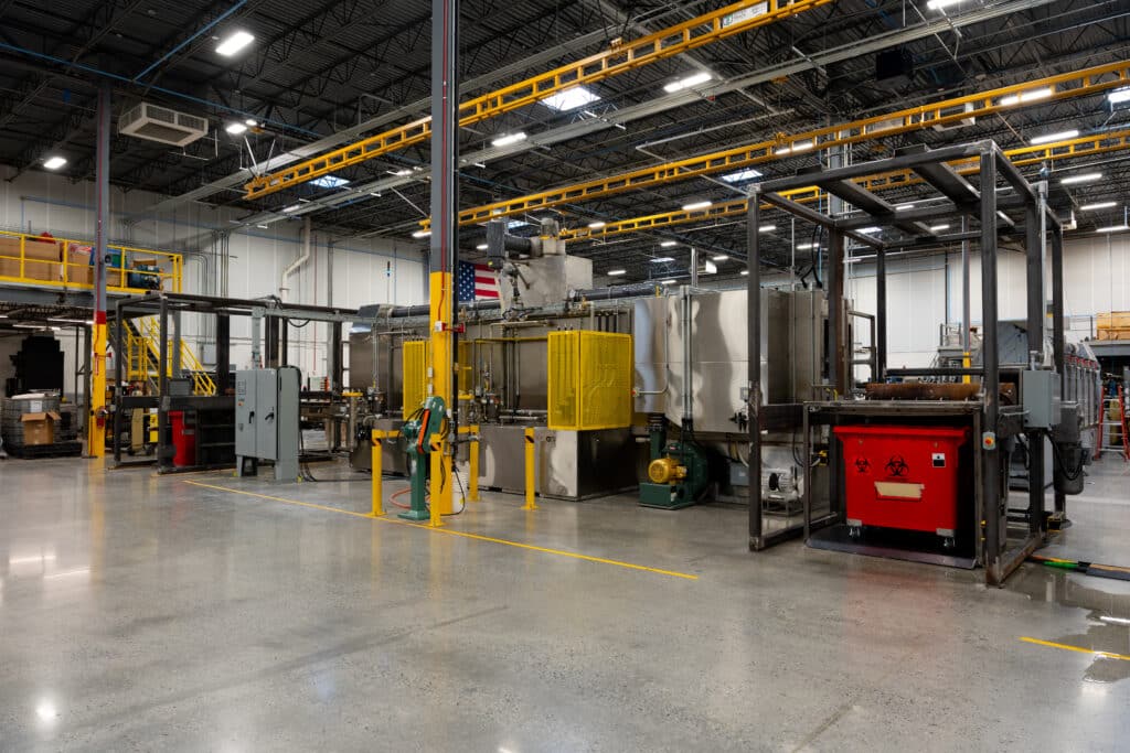 Medical Waste bin washer with automated flipping.