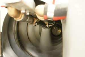 Spray nozzle of a drum washing system.