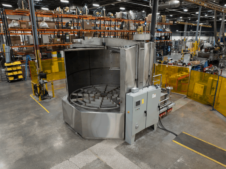 Stainless steel, multi-stage turntable part washer by Better Engineering.