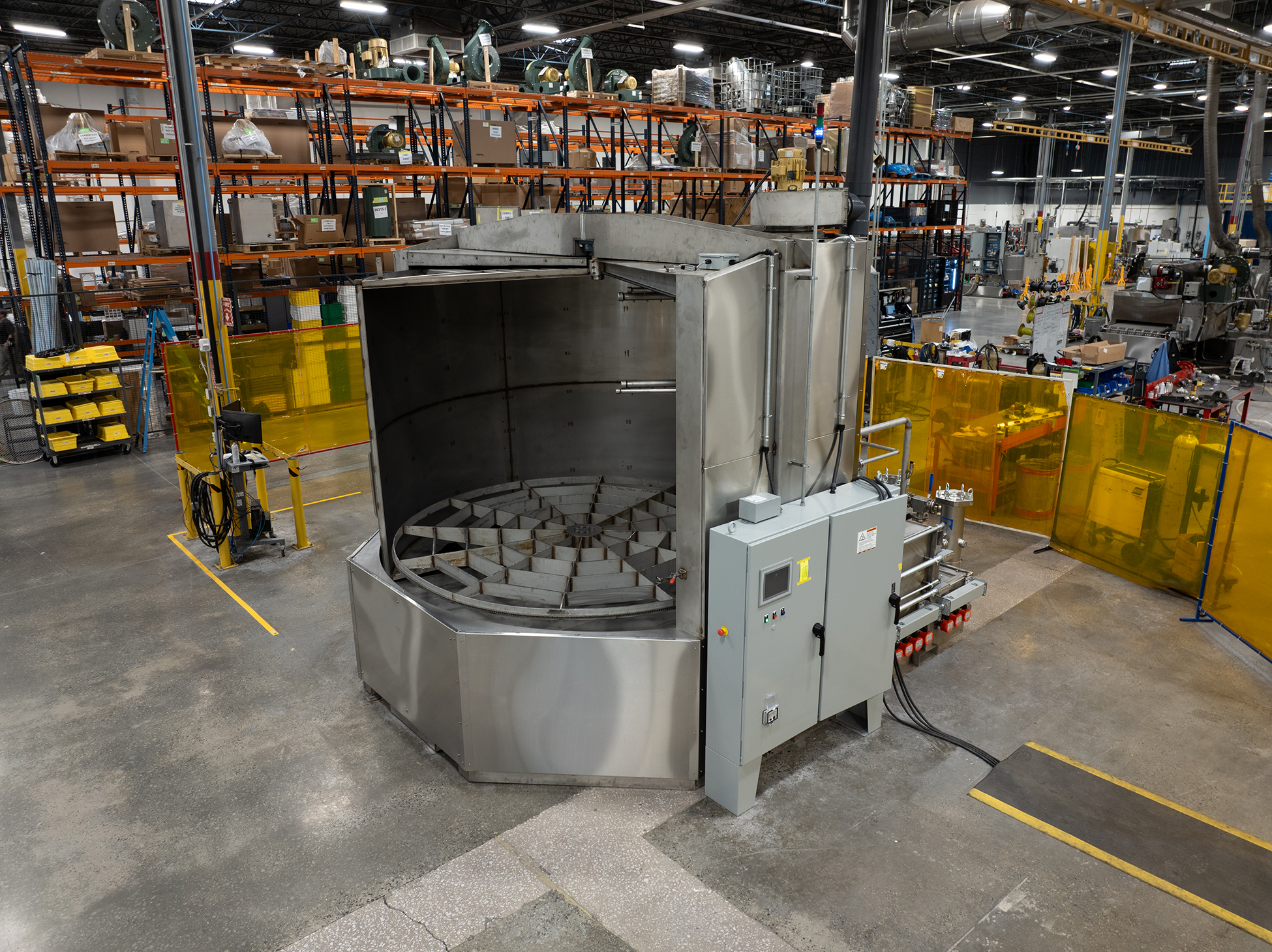 Stainless steel, multi-stage turntable part washer by Better Engineering.