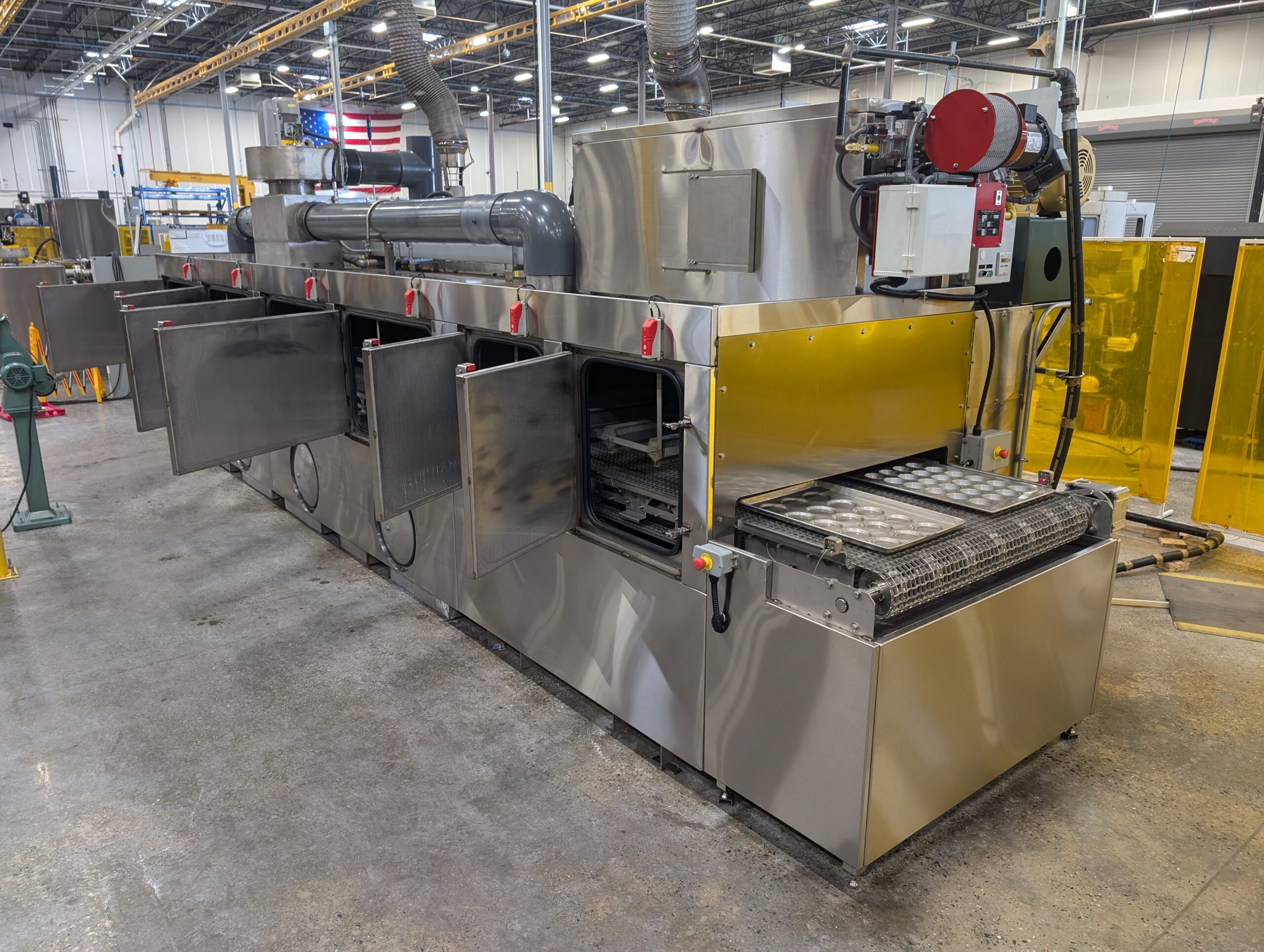 Better Engineering stainless steel C-48 sanitizing tunnel tote washer. Designed for the food processing industry to meet compliance.