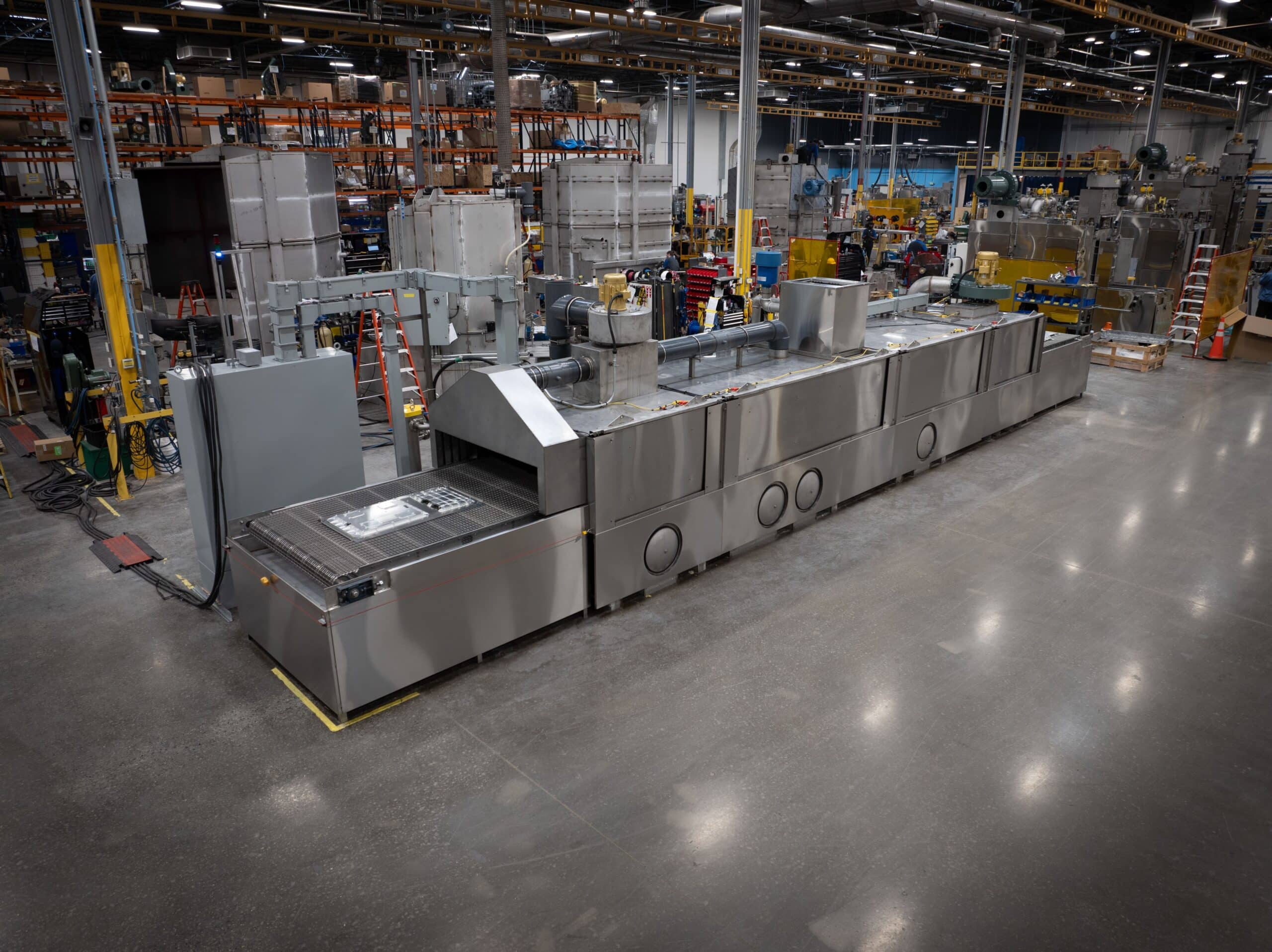 drone view of industrial parts washer for spacex client precision cleaning