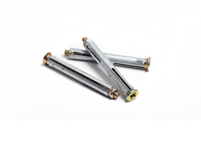 Three anchor bolts on a white background.