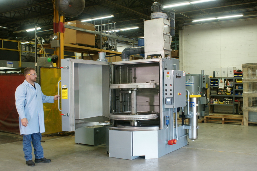 Better Engineering carousel washer cleaning engine blocks.