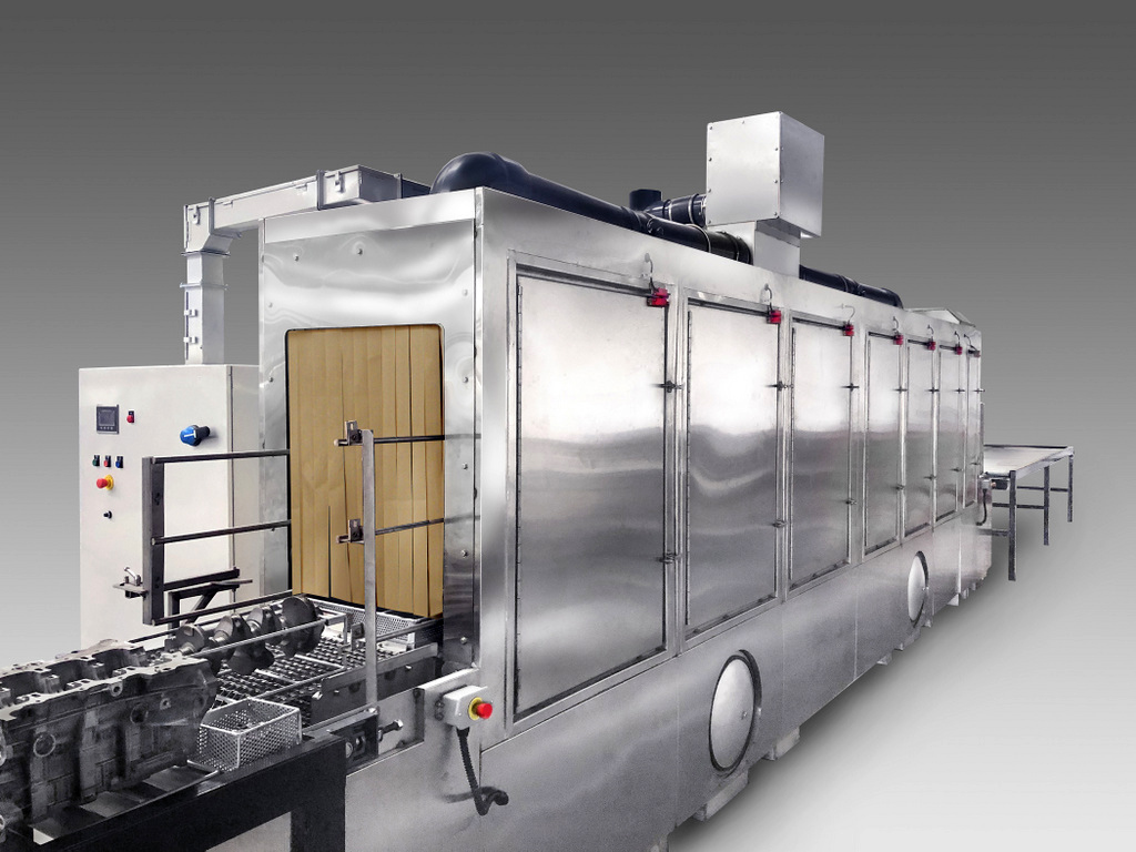 C-24-S5/S3 Conveyer Washer system designed to clean engine blocks, transmission cases, and baskets of parts.