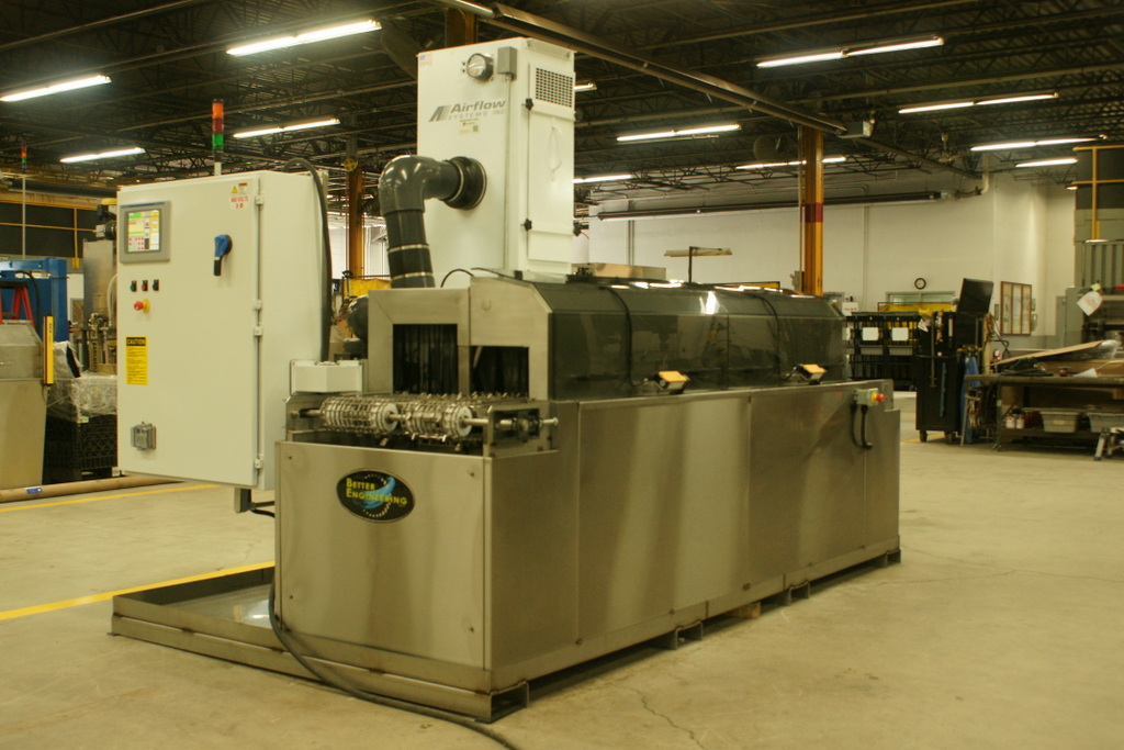 C-24 Conveyer part washer specifically designed to clean automotive driveline systems in manufacturing.