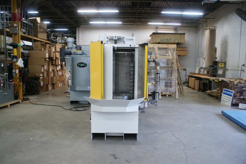 Automotive Turntable washer designed to clean tulip joints and driveshaft components.