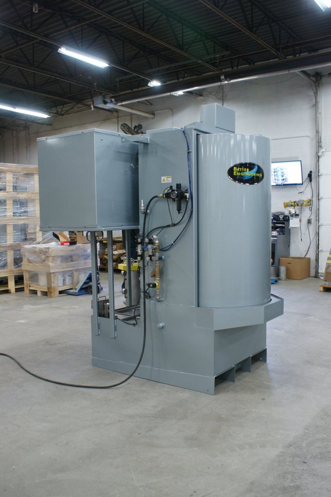 Turntable Parts Washer designed to clean weapons barrels.