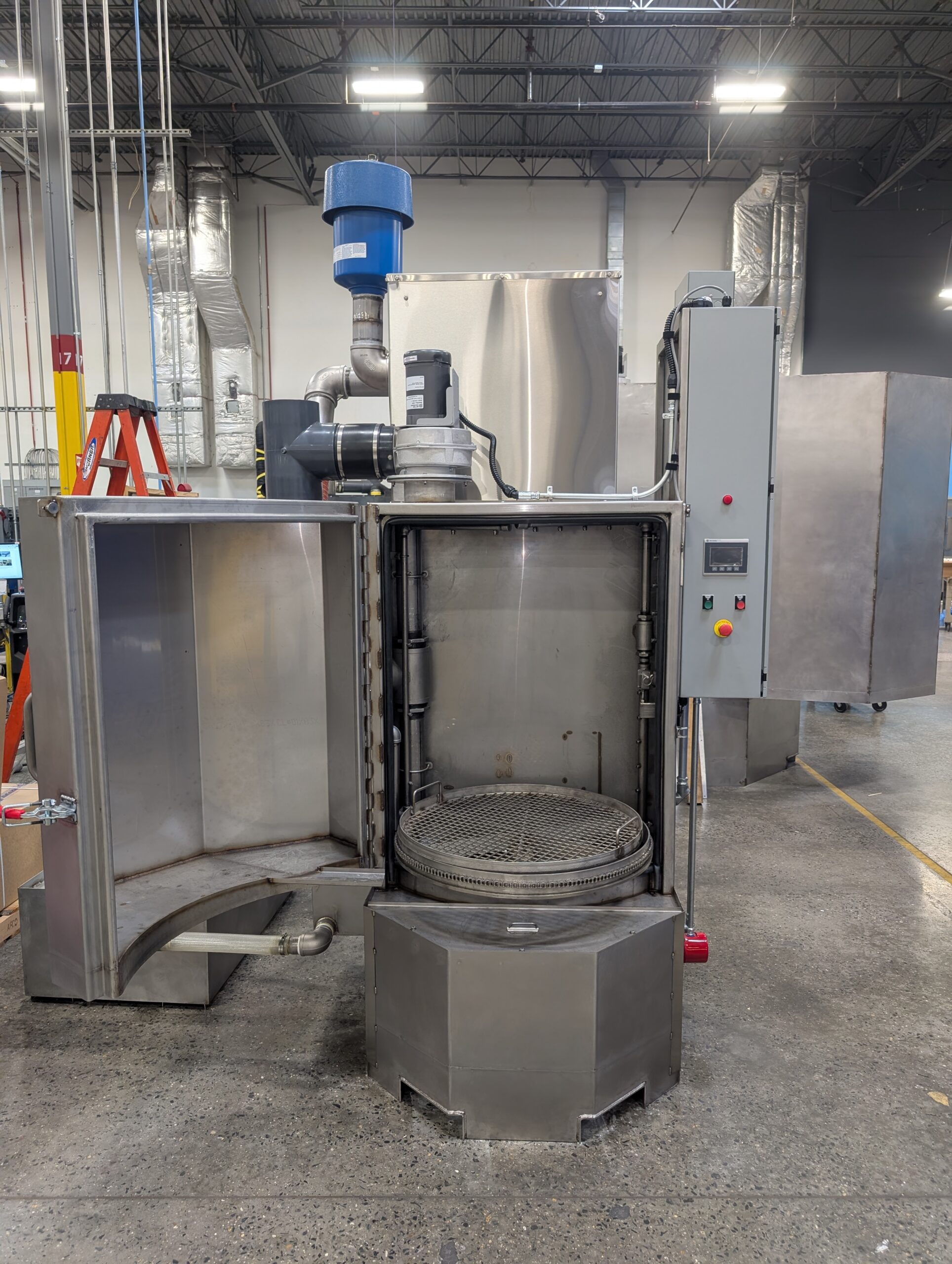 Cabinet parts washer designed to clean aerospace components.