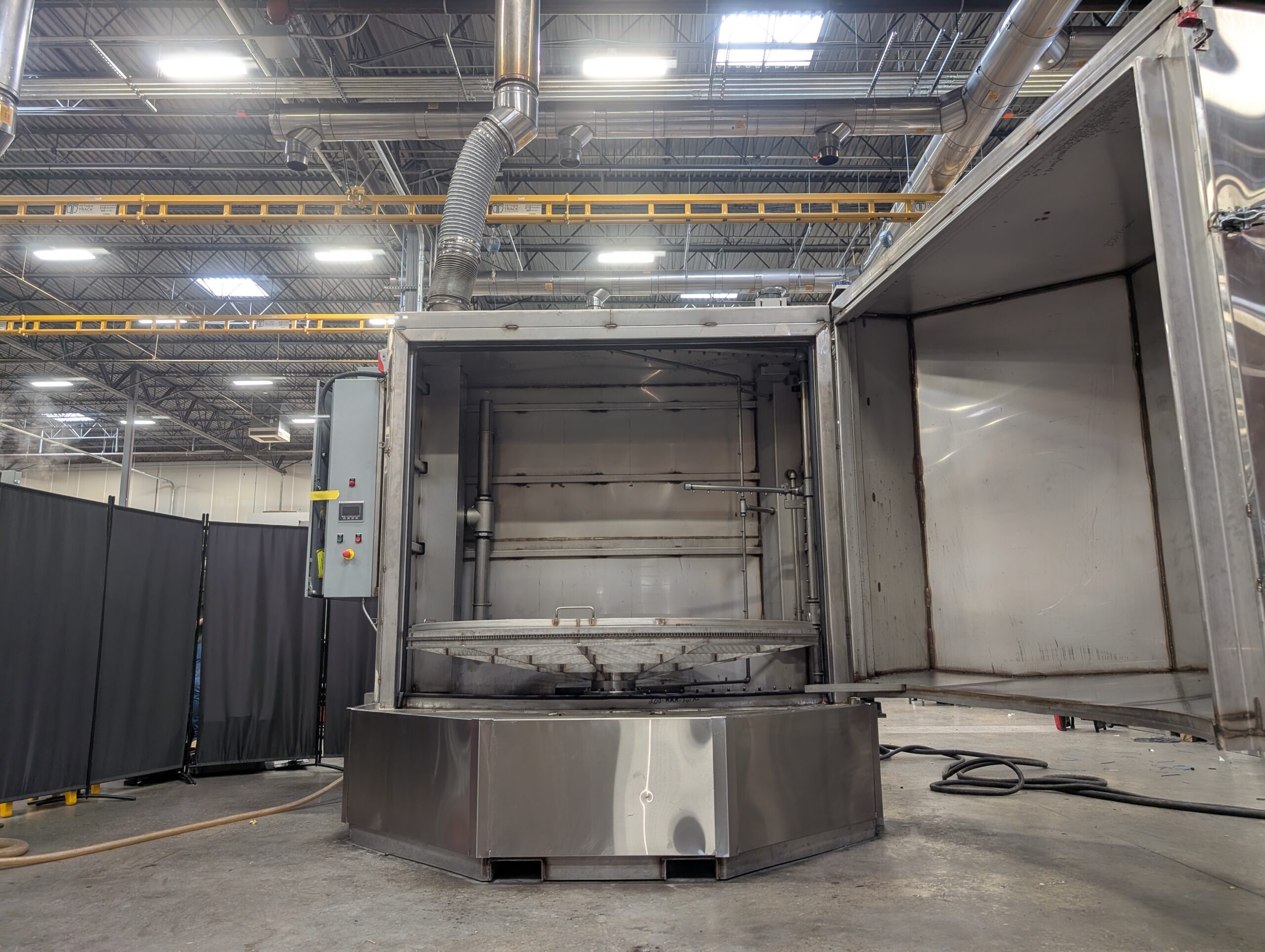 Cabinet Parts Washer designed for cleaning large rail components.