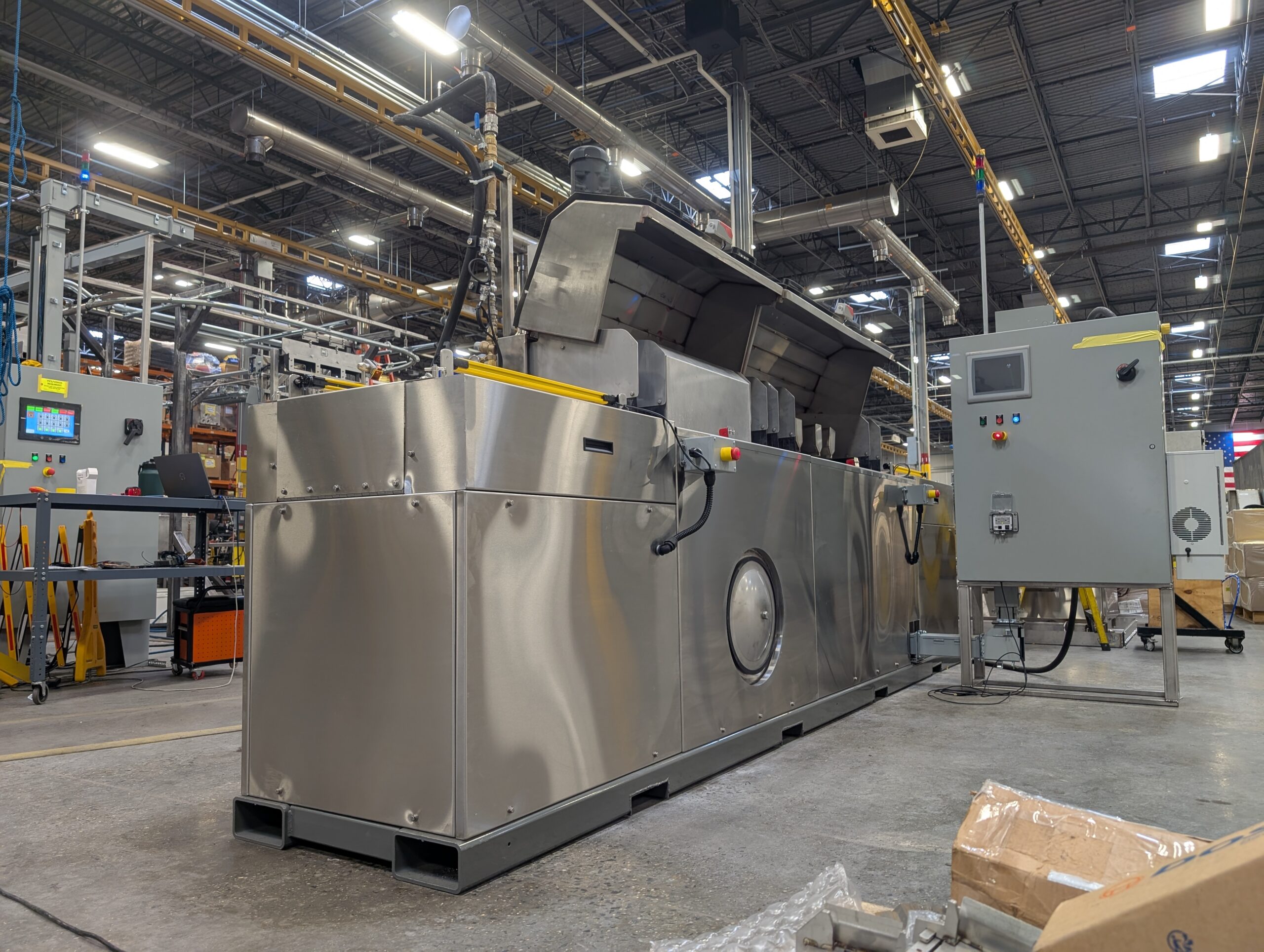 Tunnel Washer designed to clean saw blades.